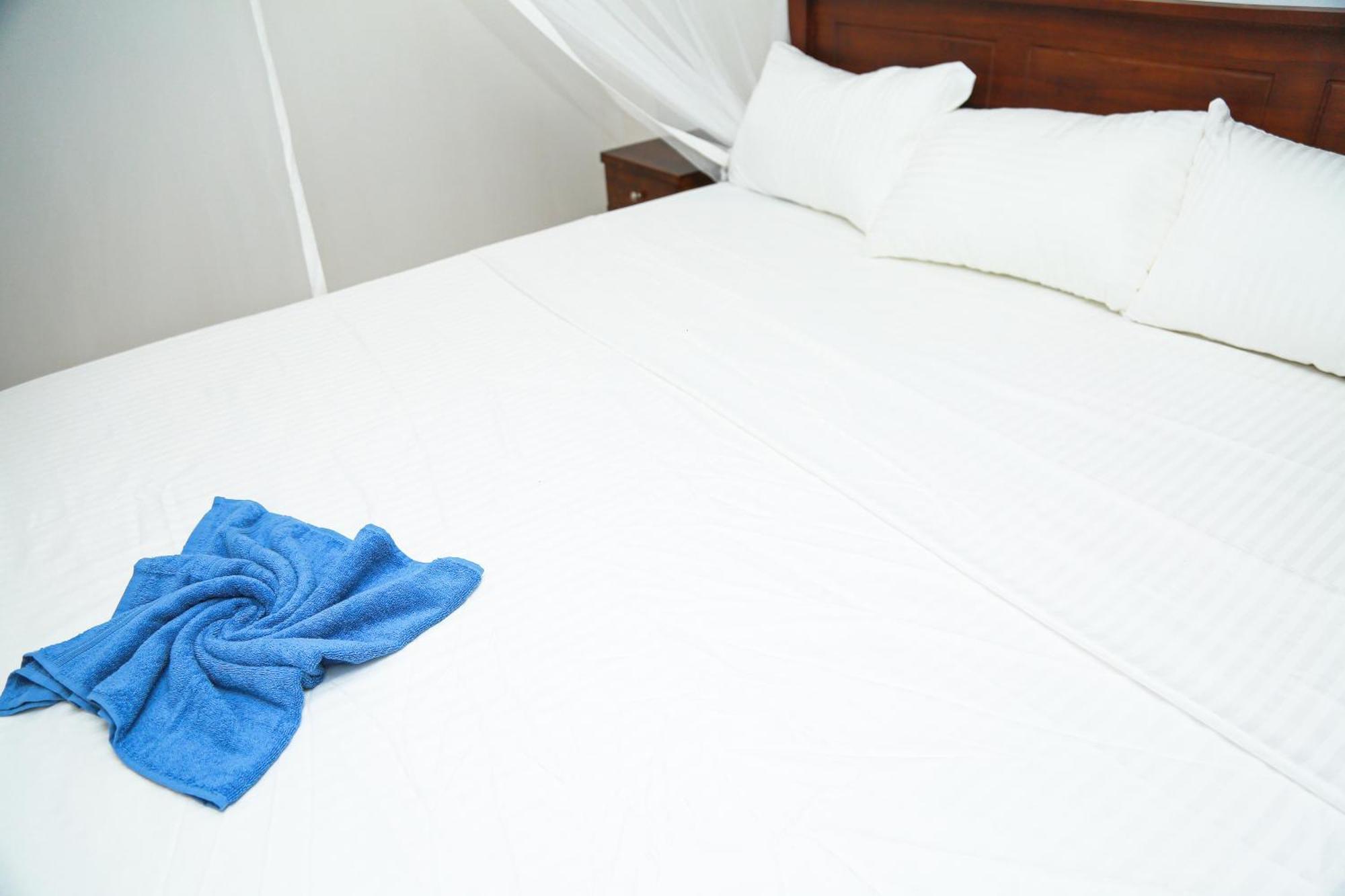 Camellia Hotel & Restaurant Мириса Екстериор снимка