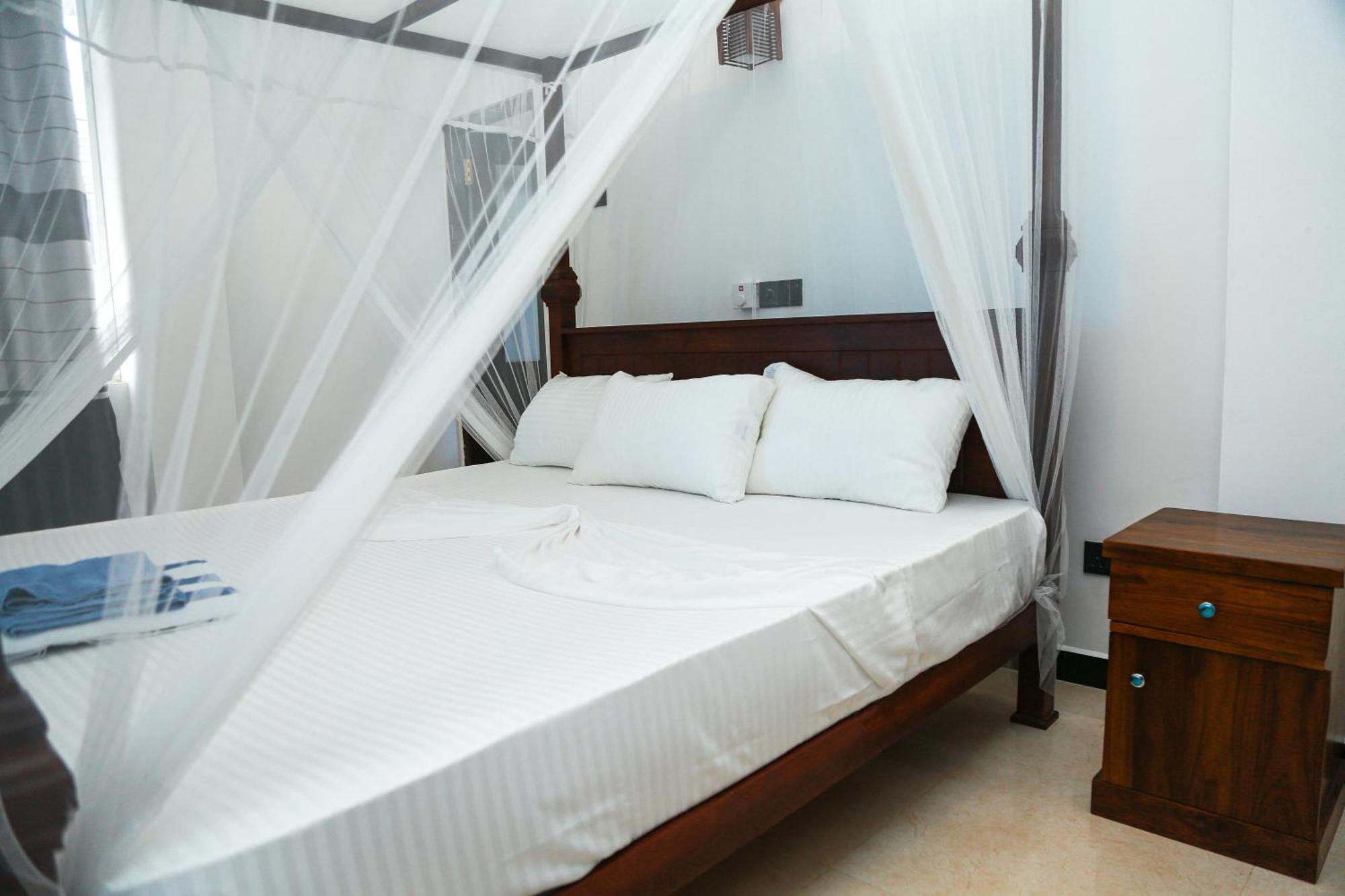 Camellia Hotel & Restaurant Мириса Екстериор снимка