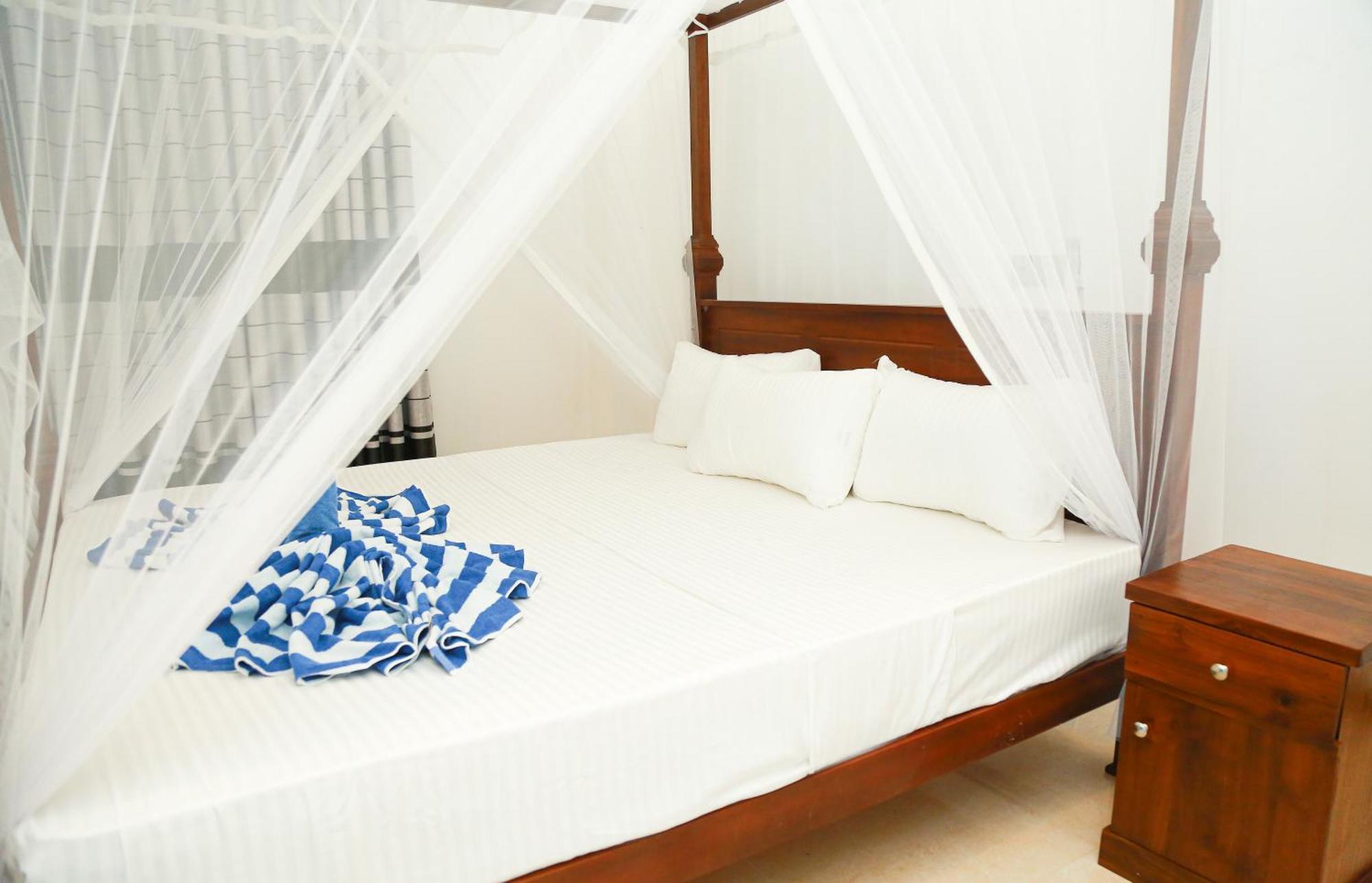 Camellia Hotel & Restaurant Мириса Екстериор снимка